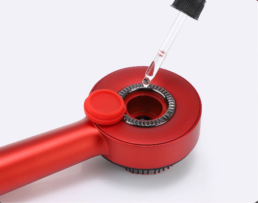 Applicateur d'huile pour cuir chevelu massant